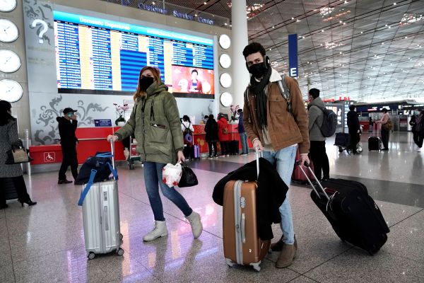 中国取消入境航班熔断机制 集中隔离期缩短至5天 